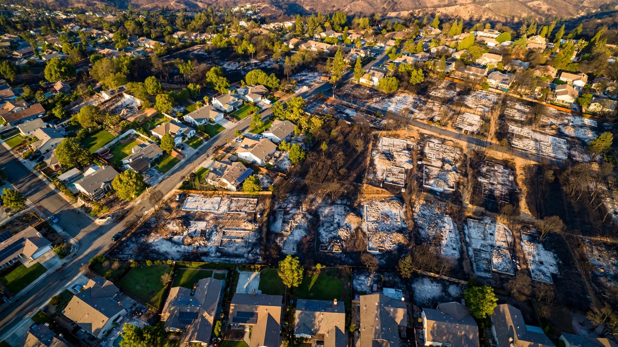 Your Fire-Resistant Roof Cost $13,000. The Model Says the House Thirty Feet Away Matters More.